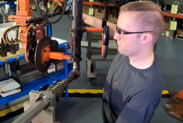 G3 Industries employee working at their station