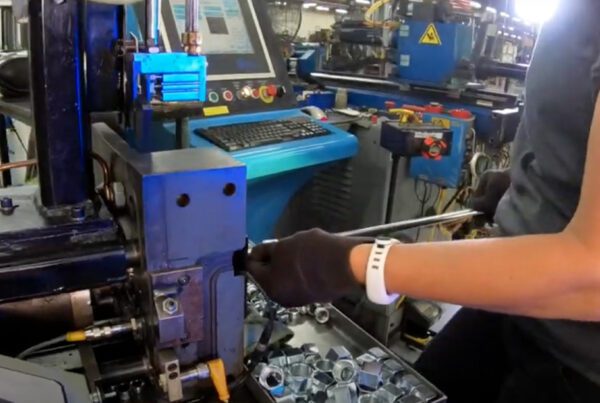 G3 Industries employee working at their station