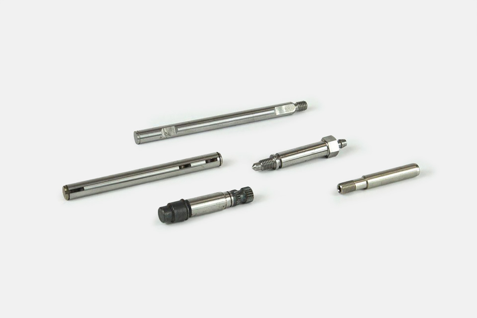 Pieces of metal that have gone through the machining and turning process