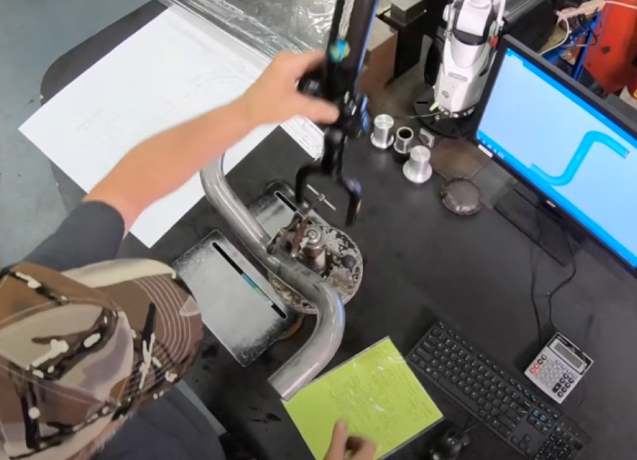 A G3 Industries employee working at their station