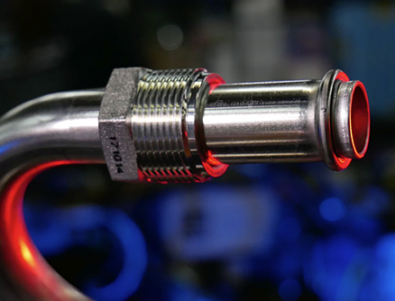 Tube fabricated piece of metal
